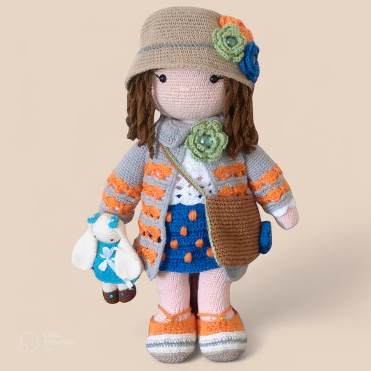 Handmade personalized crochet doll Mandy with detailed accessories – custom amigurumi gift.Close up image

