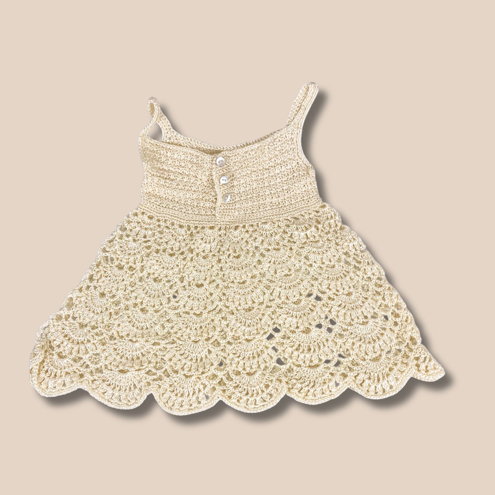 Flared backview of handcrochet silk dress