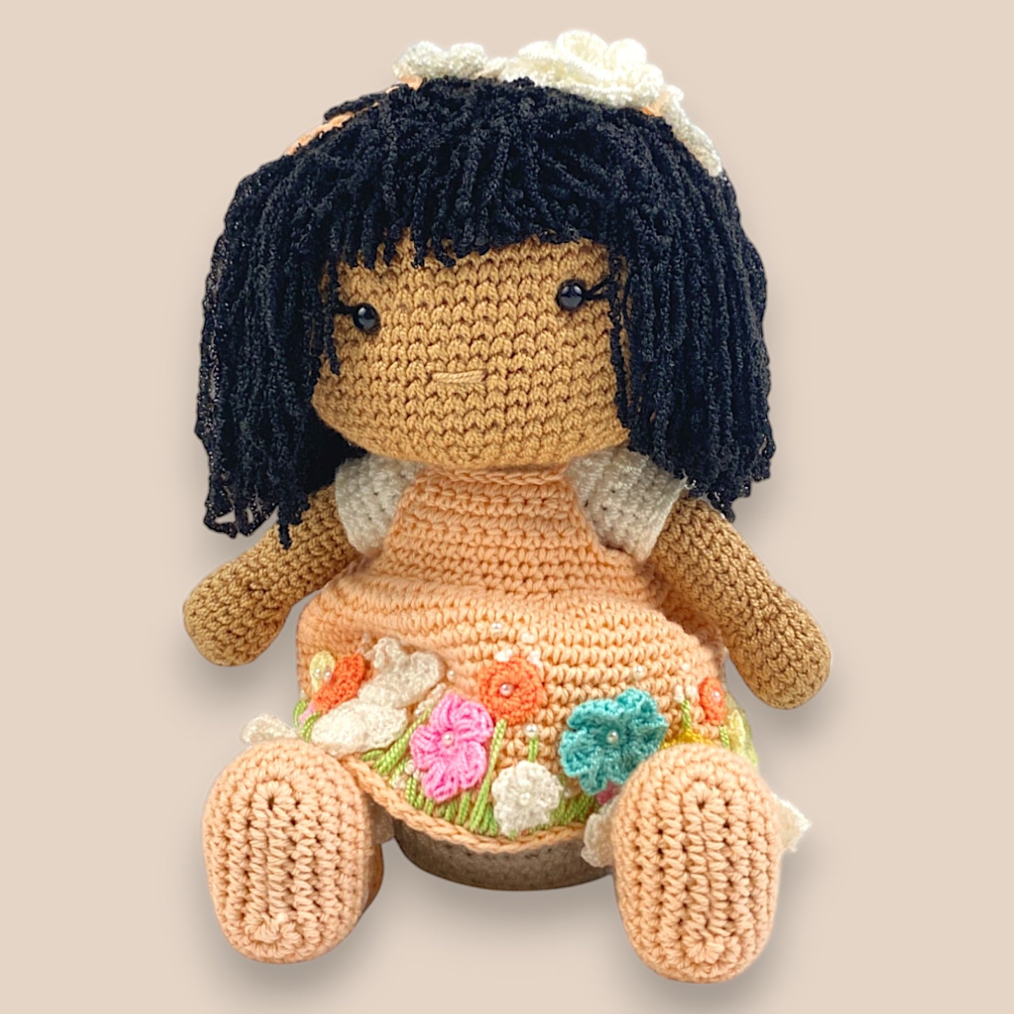 sitting front image of chinni crochet amigurumi doll 