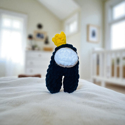 black color among us toy with yellow crown can be used as toy or charm