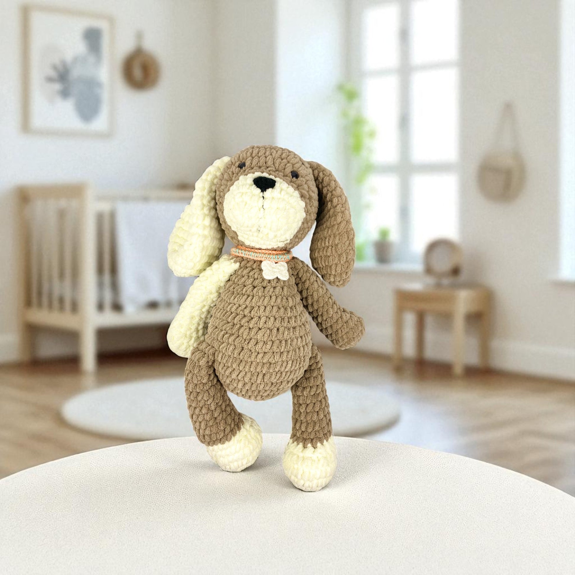 full front view of brwon and cream crochet dog bailey