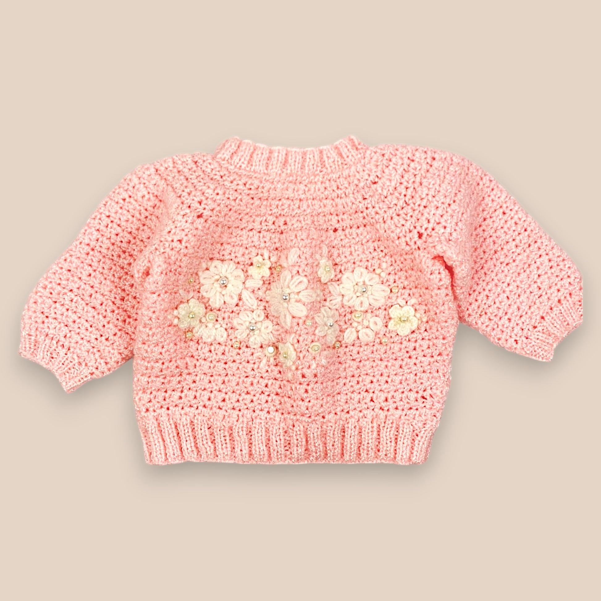 hand Knitted Sweater Pink with embroidered flowers in front