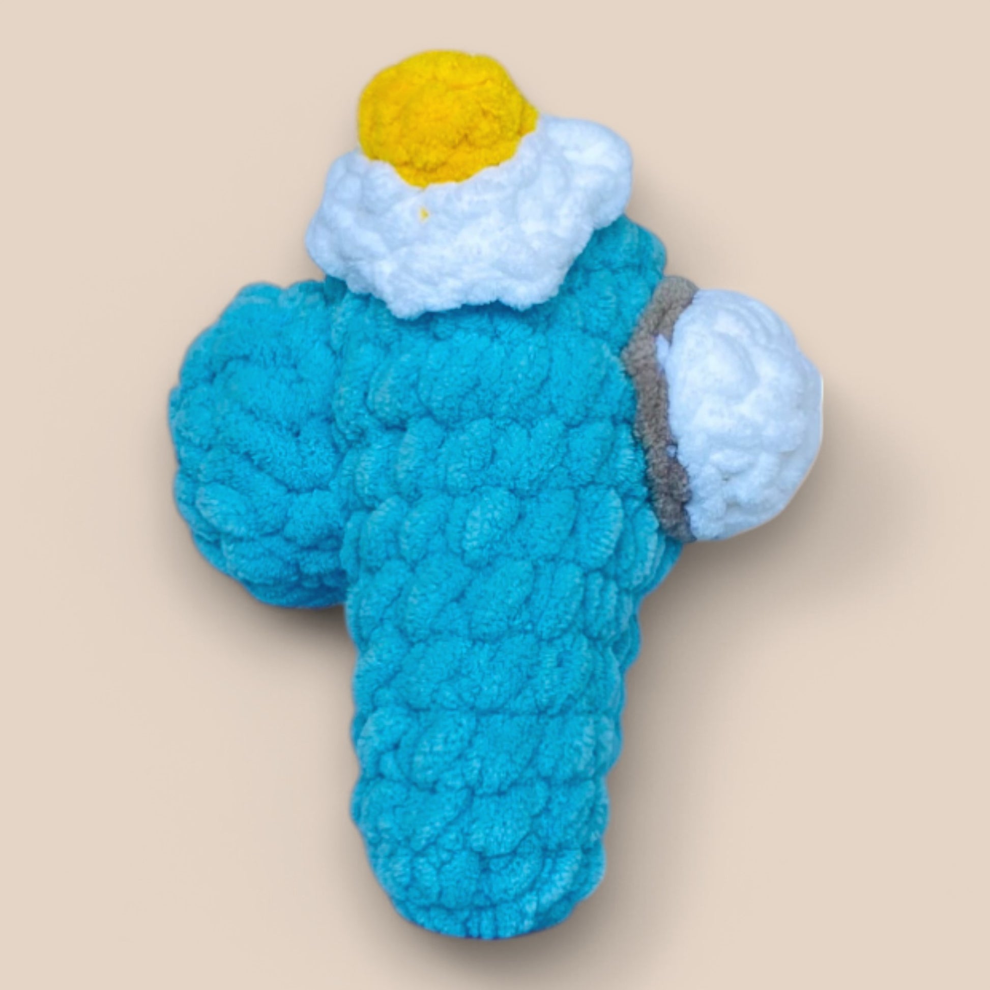 side view of Hand-crocheted Among Us plushies made from soft, chunky yarn