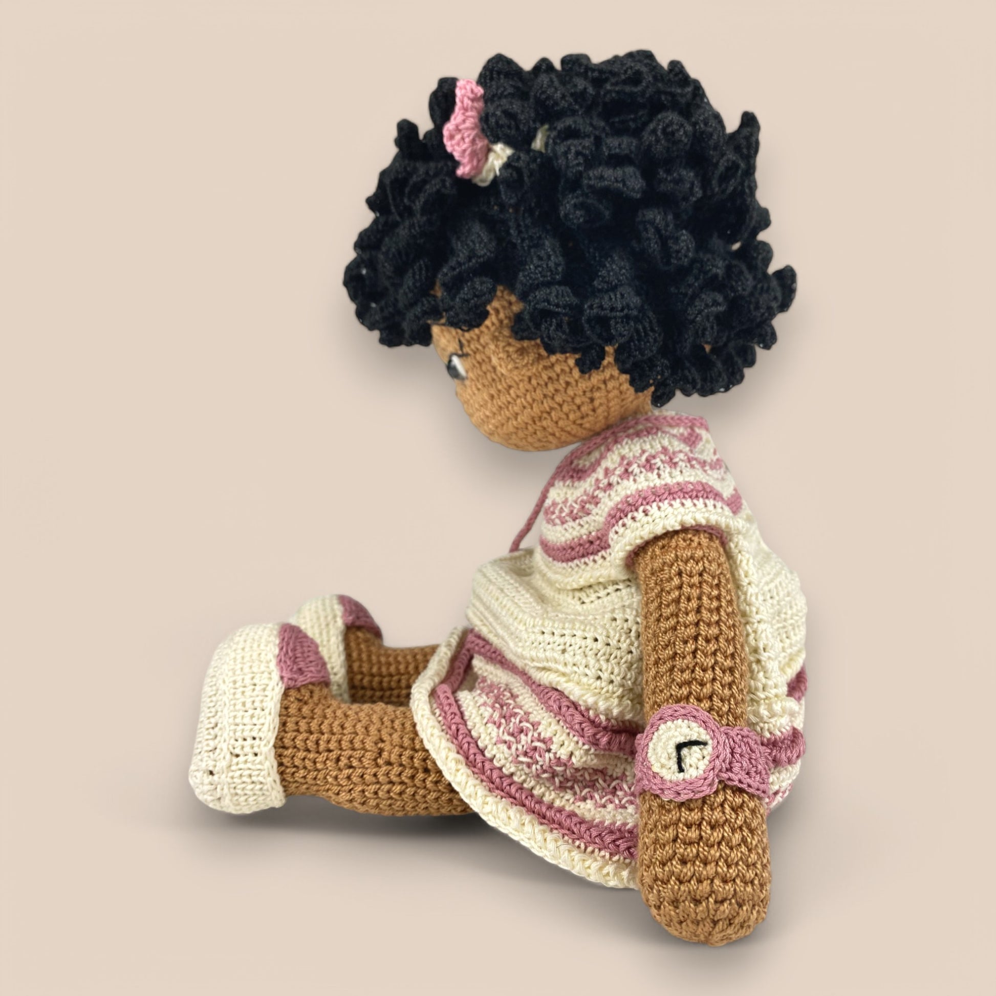 left side view of crochet ziggy doll